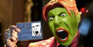 angry hand holding_object id irl mask movie open_mouth orange_hair son_of_the_mask soyjak text the_lawnmower_man tv_(4chan) variant:cobson // 961x492 // 65.2KB