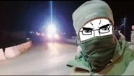 HTS SNA camouflage free_syrian_army full_body glasses hair irl_background pointing_up selfie soyjak subvariant:chudjak_front syria syrian_civil_war variant:chudjak war // 1258x720 // 64.2KB